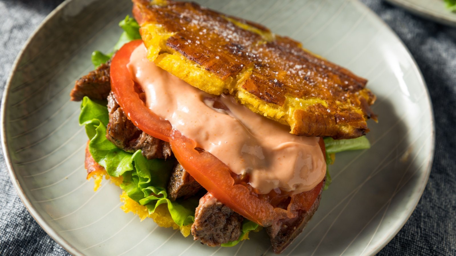 Homemade Puerto Rican Jibarito Steak Sandwich with Lettuce and Tomato Brent Hofacker Shutterstock Homemade Puerto Rican Jibarito Steak Sandwich with Lettuce and Tomato Brent Hofacker Shutterstock