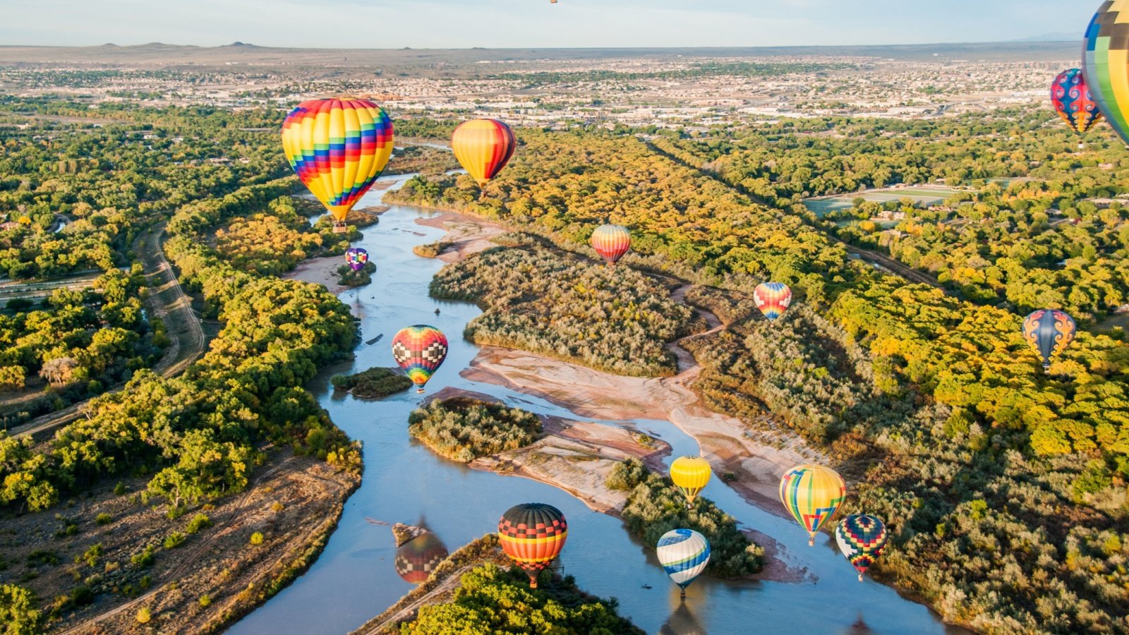 Hot Air Balloons over Rio Grande in New Mexico Albuquerque Greg Meland Shutterstock