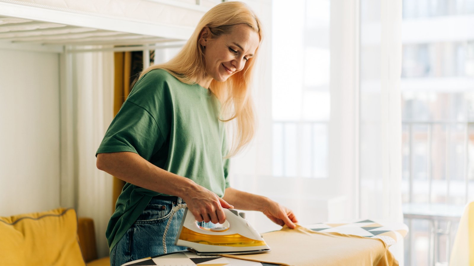 Housework Clothes Woman Ironing Ilona Kozhevnikova Shutterstock