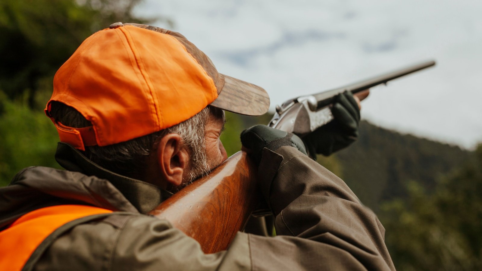 Hunter Aiming Firearm resulsakinmaz Shutterstock