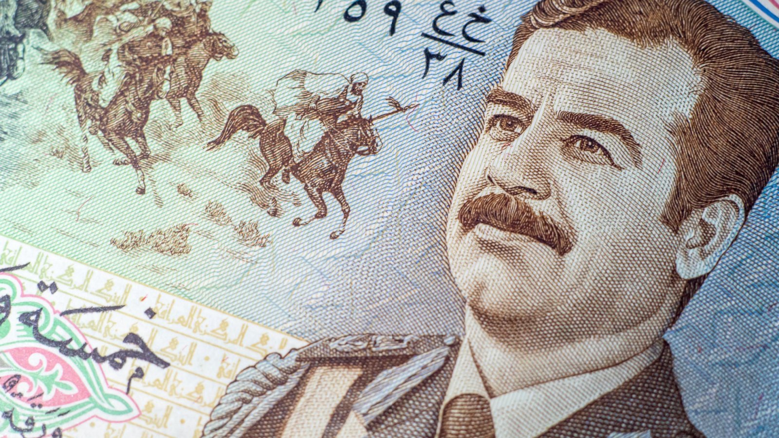 Iraqi Dinars issued by Saddam Hussein Chintung Lee Shutterstock