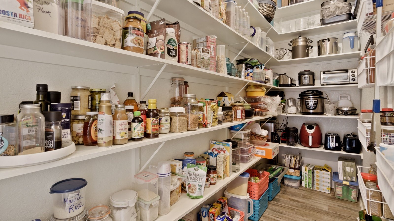 Kitchen pantry home cooking spices products baking small appliance toaster crock pot recipe ingredients food closet Allison H Smith Shutterstock