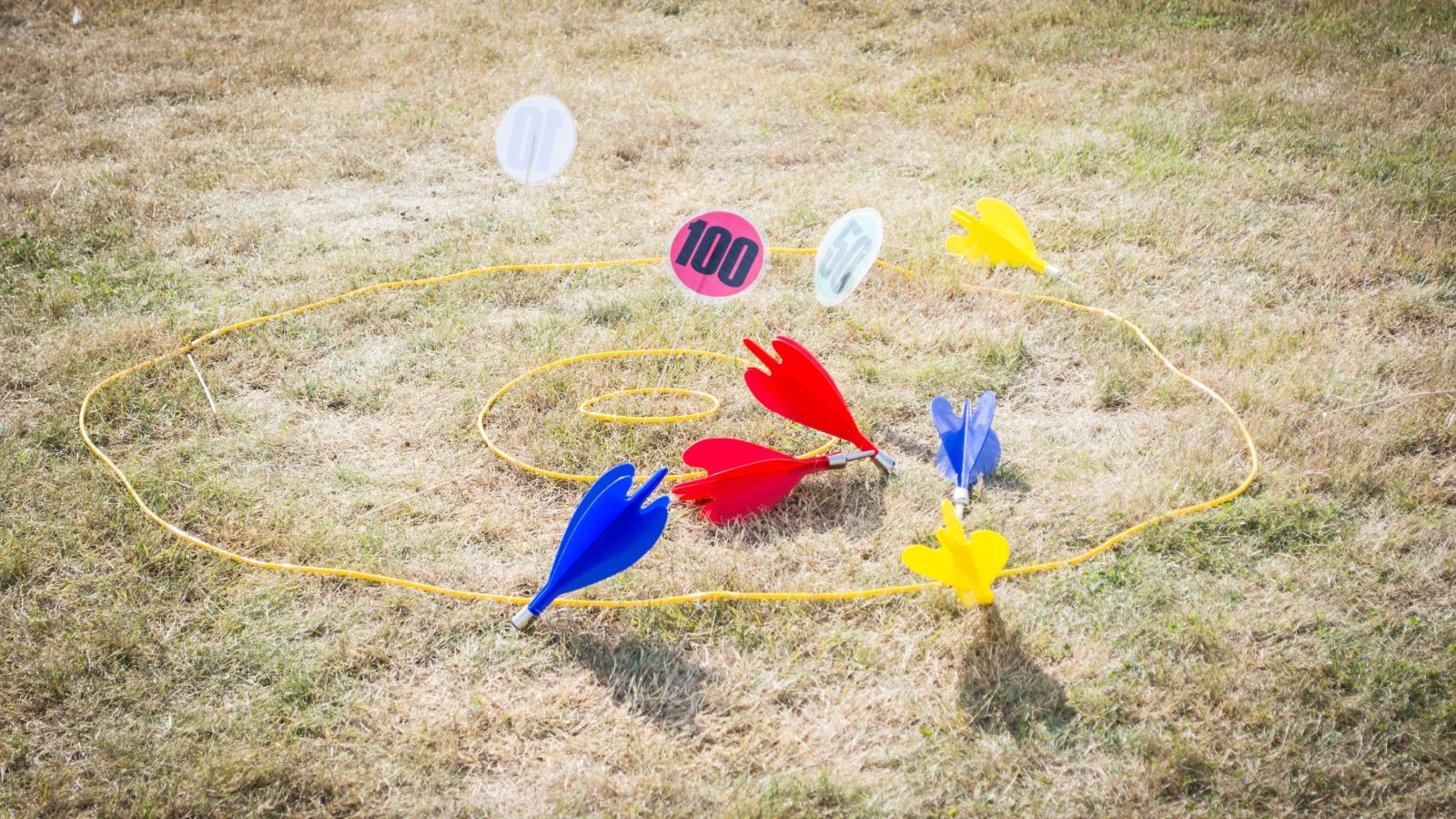 Lawn dart game outdoors called Jarts DrKing Shutterstock