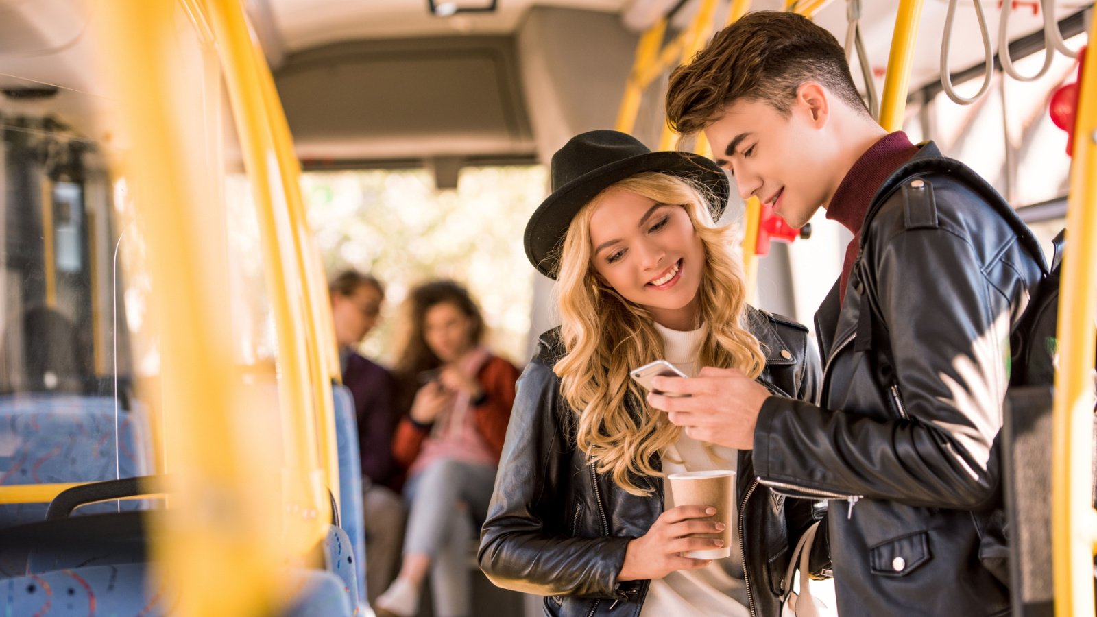 Leather Jacket Public Transportation Phone LightField Studios Shutterstock