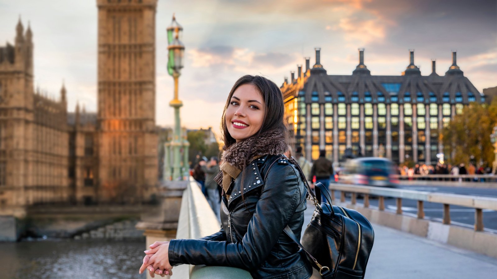 London traveler tourist enjoys the view to the Westminster Palace and Big Ben sven hansche shutterstock