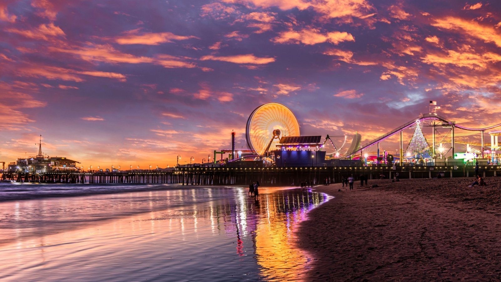 Los Angeles Santa Monica pier California amusement park ferris wheel roller coaster Larry Gibson Shutterstock