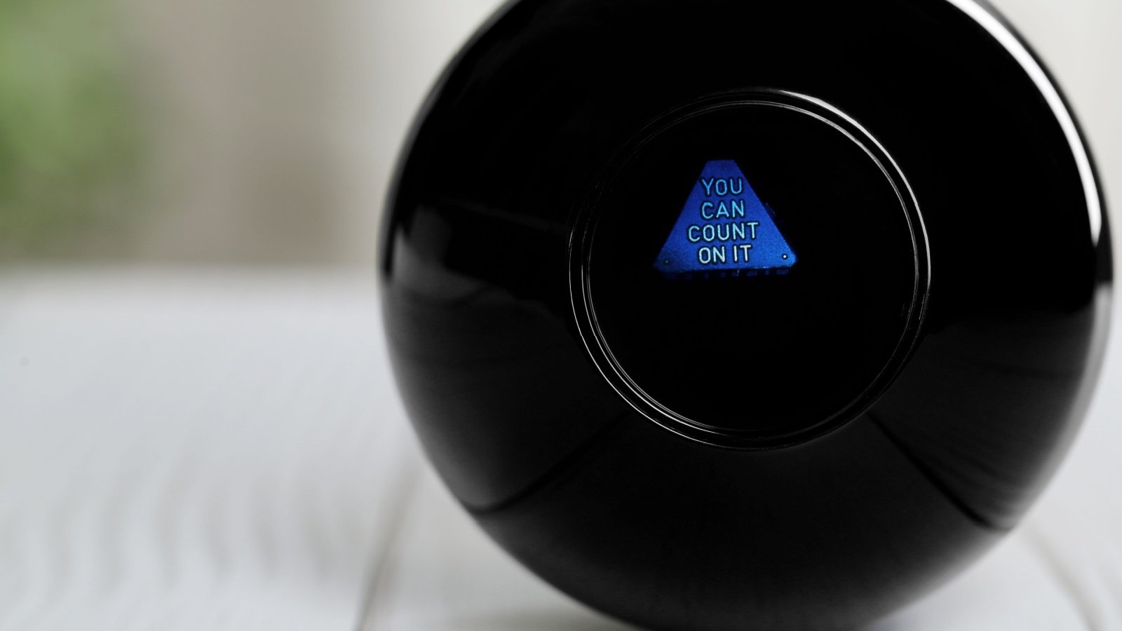 Magic eight ball you can count on it 8 toy game luck chance predict fortune New Africa Shutterstock