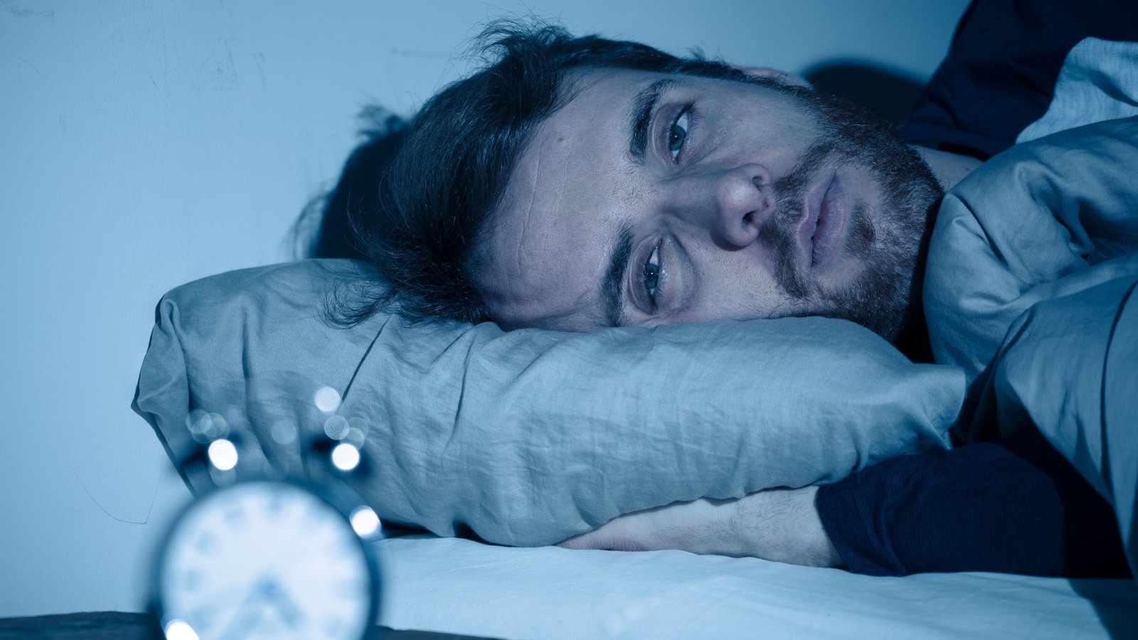 Male Insomnia sleepless sick tired SB Arts Media Shutterstock