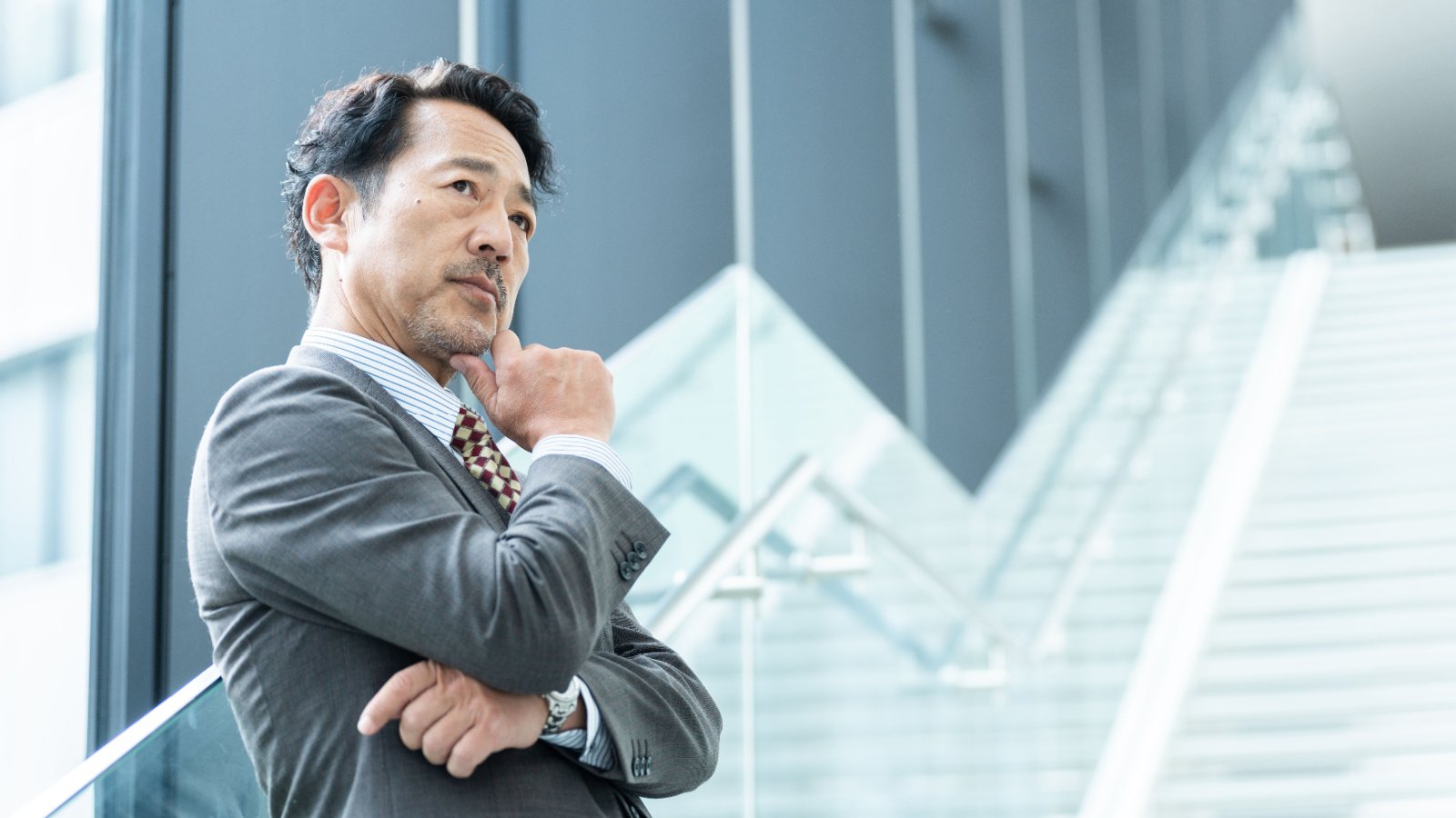 Male Nervous Anxious Thinking Work Concerned polkadot photo Shutterstock