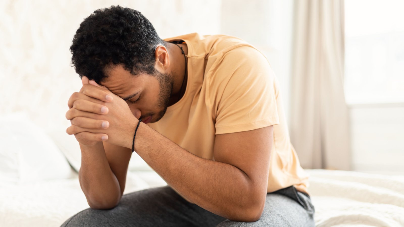 Male Nervous anxious depressed sad tired Prostock studio Shutterstock