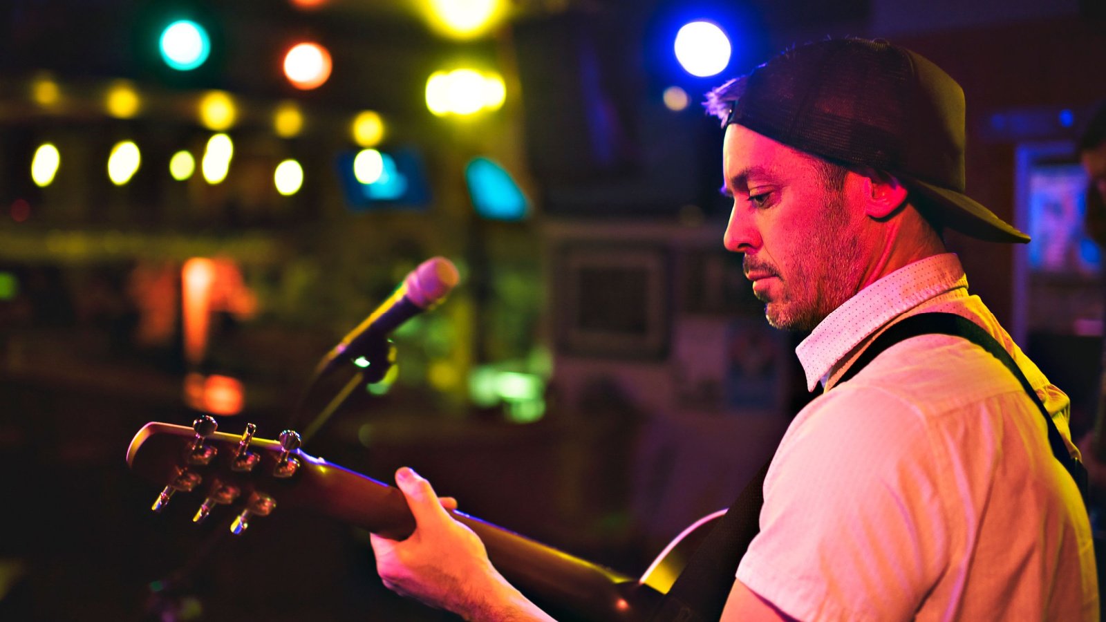 Male playing guitar musician Lopolo Shutterstock