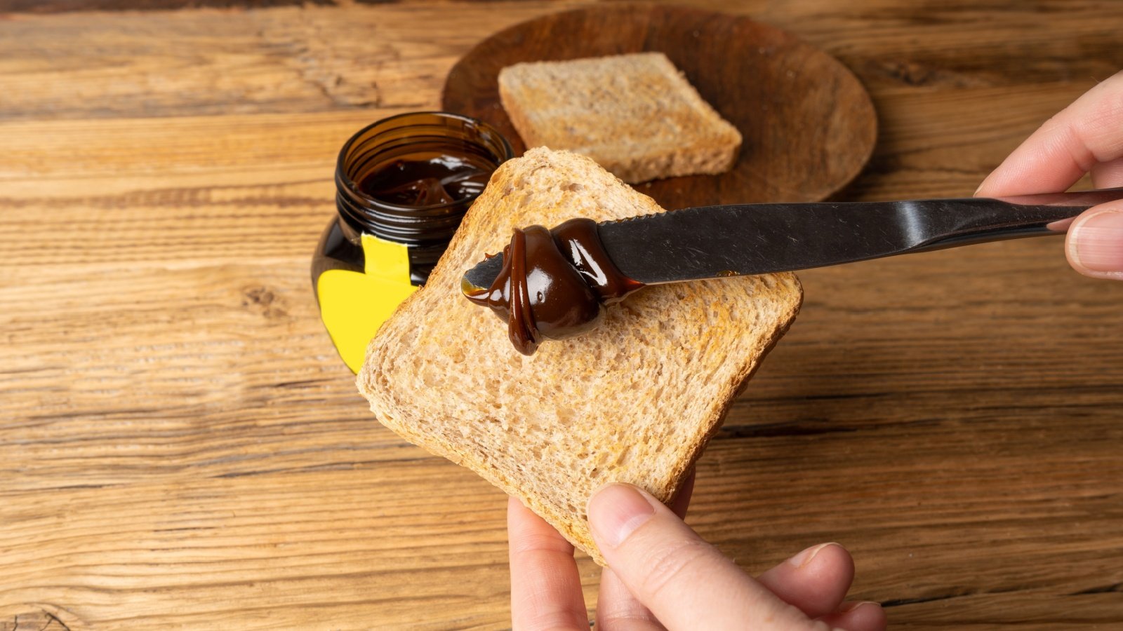 Marmite Yeast Spread Vegemite Spread on toast Ermak Oksana Shutterstock