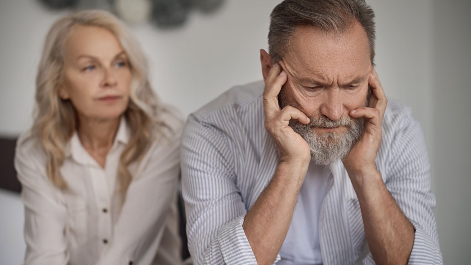 Mature married couple keeping silence after an argument father parents fight dmytro zinkevych shutterstock