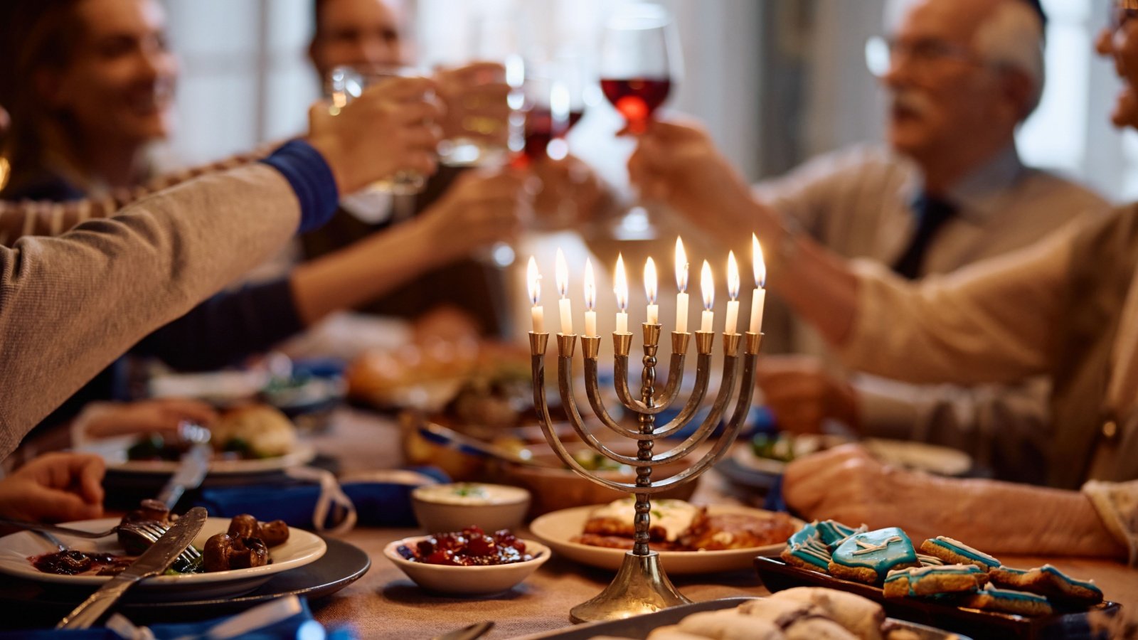 Menorah with lit candles Hanukkah Israel Jewish holiday religion Drazen Zigic Shutterstock