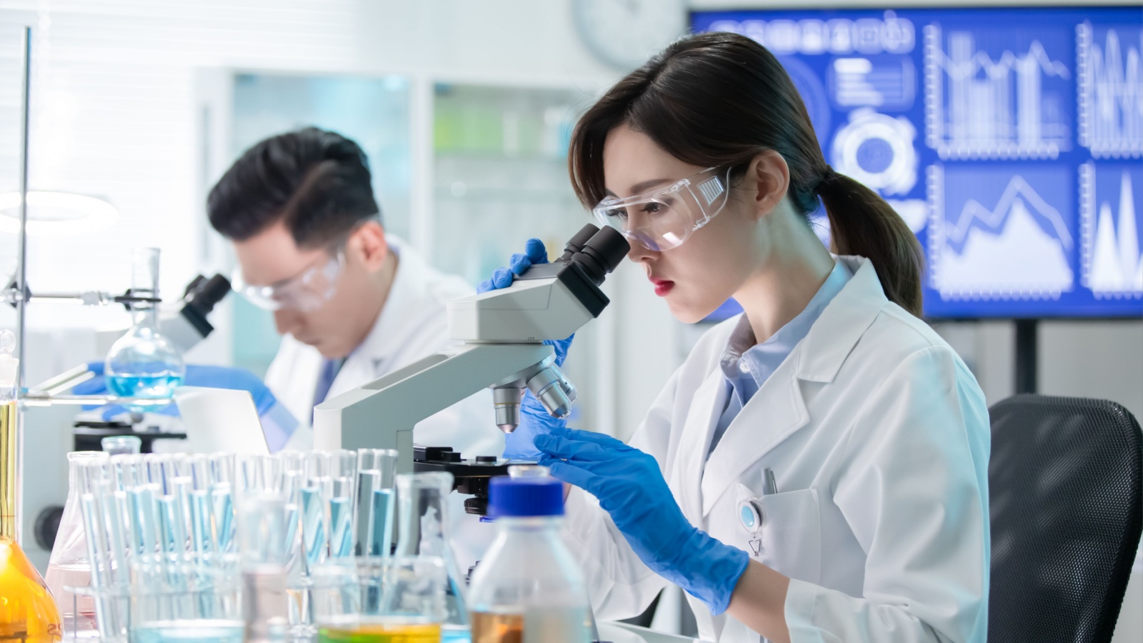 Microscope Science Scientist Lab Woman POC aslysun Shutterstock