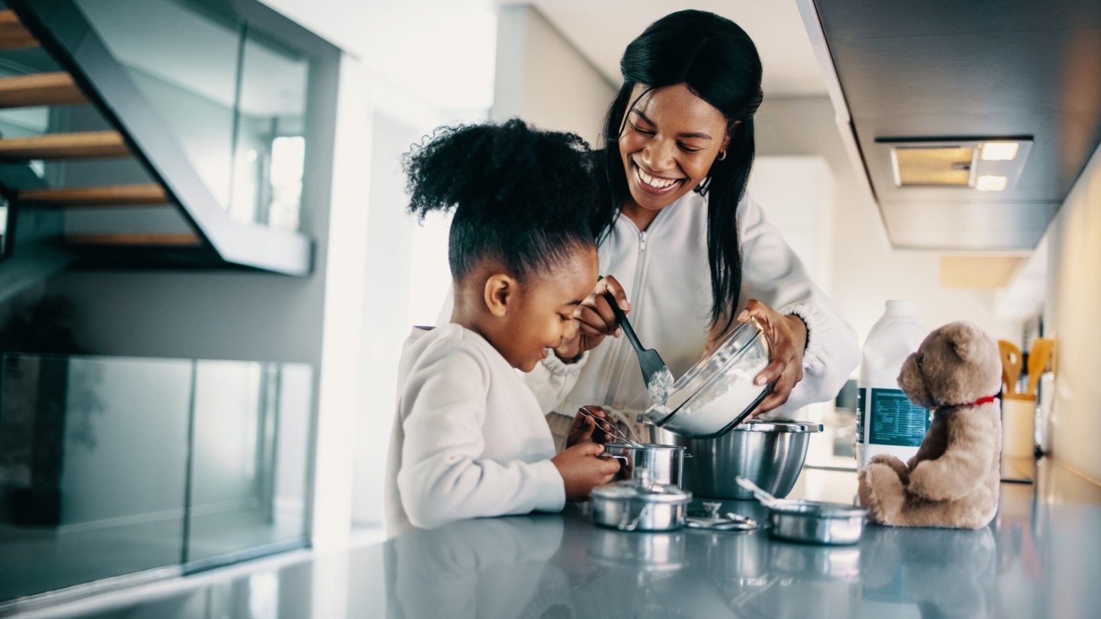 Mother and daughter baking kitchen cooking Jacob Lund Shutterstock