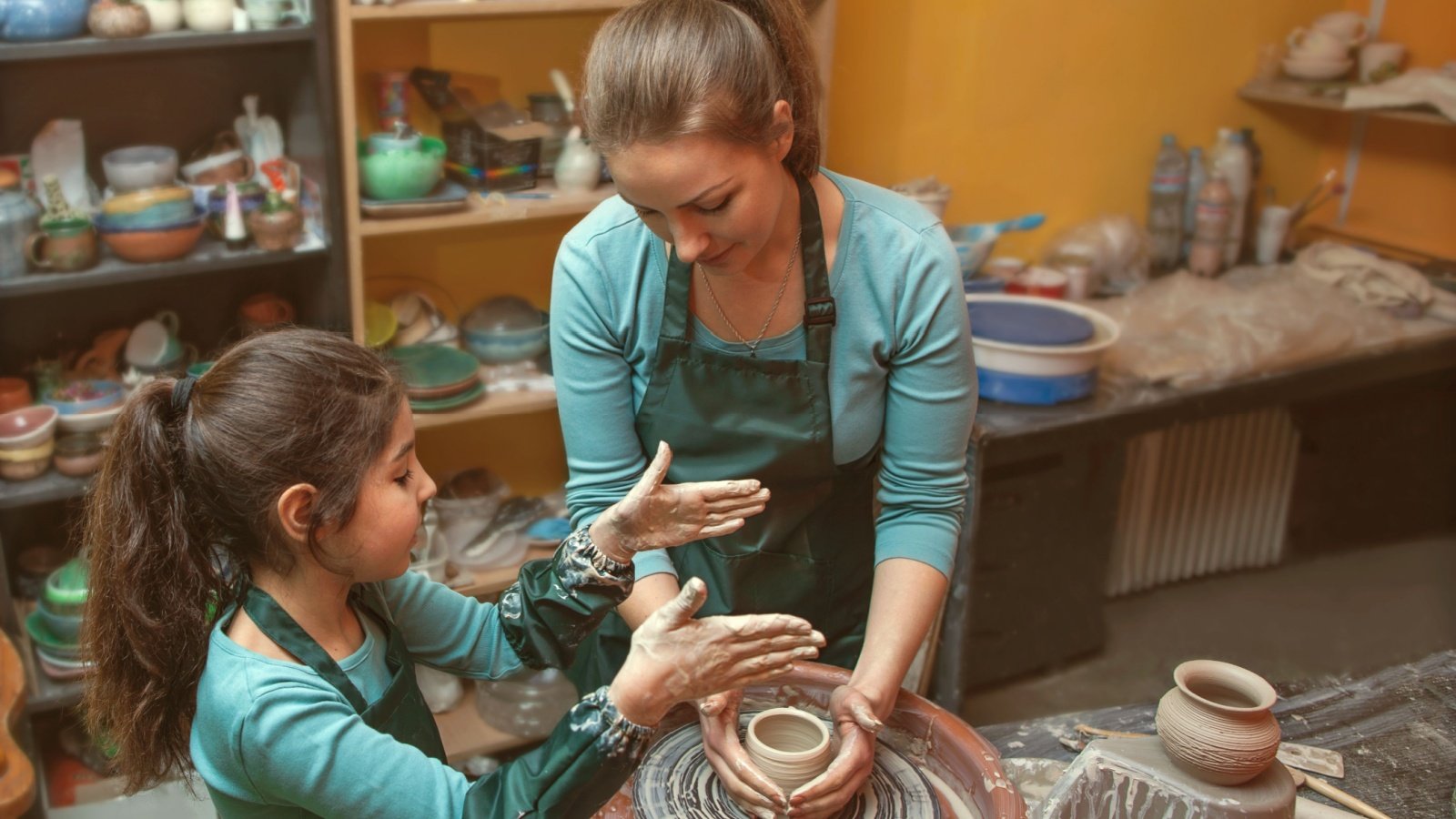 Mother daughter Mom Art pottery clay Rock and Wasp Shutterstock