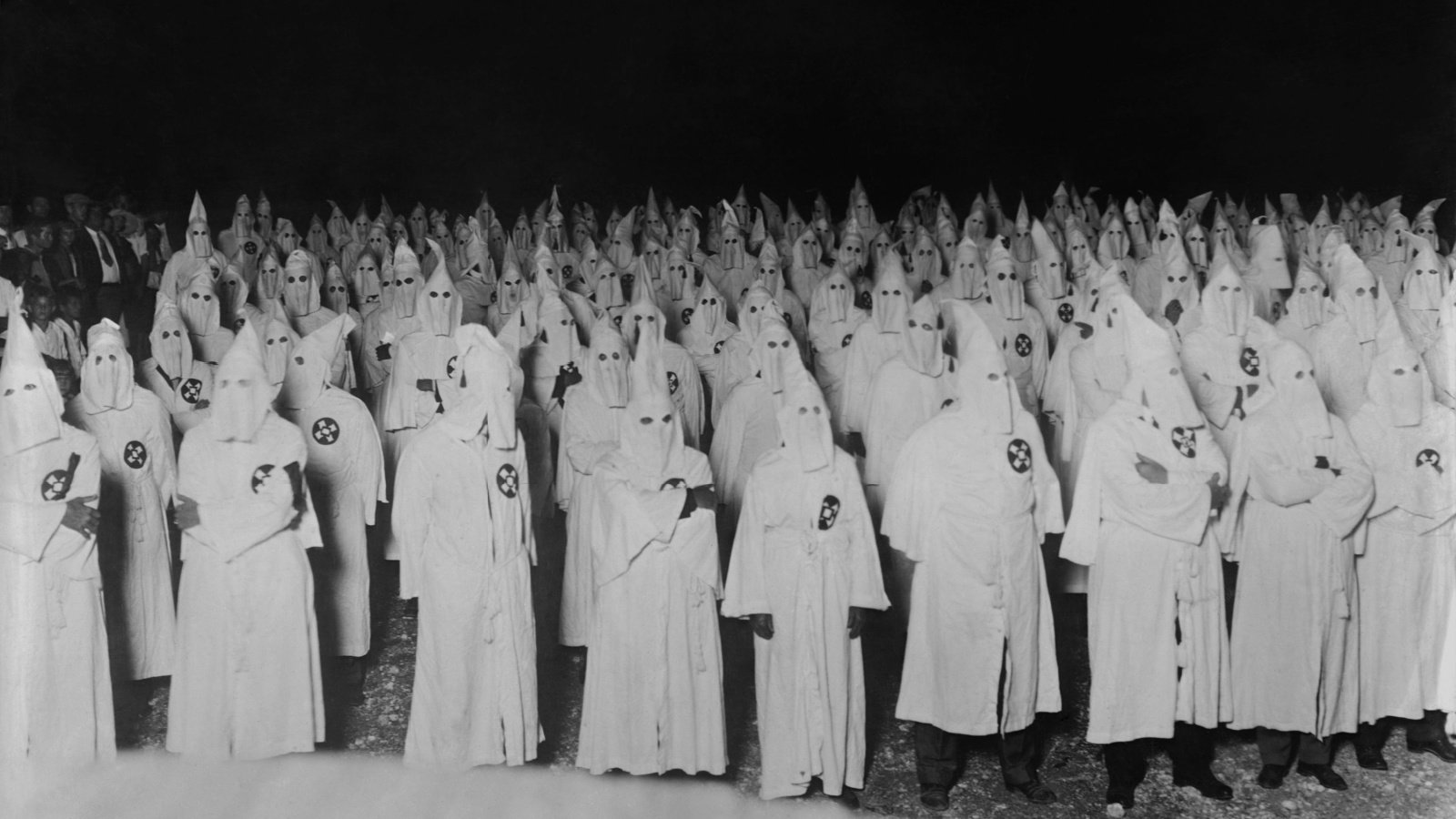 Nocturnal gathering of robed and hooded Ku Klux Klan KKK Everett Collection Shutterstock