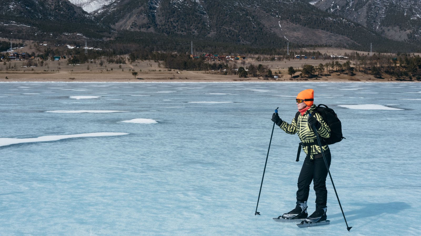 Norwegian ice skates Norway frozen lake John Danow Shutterstock