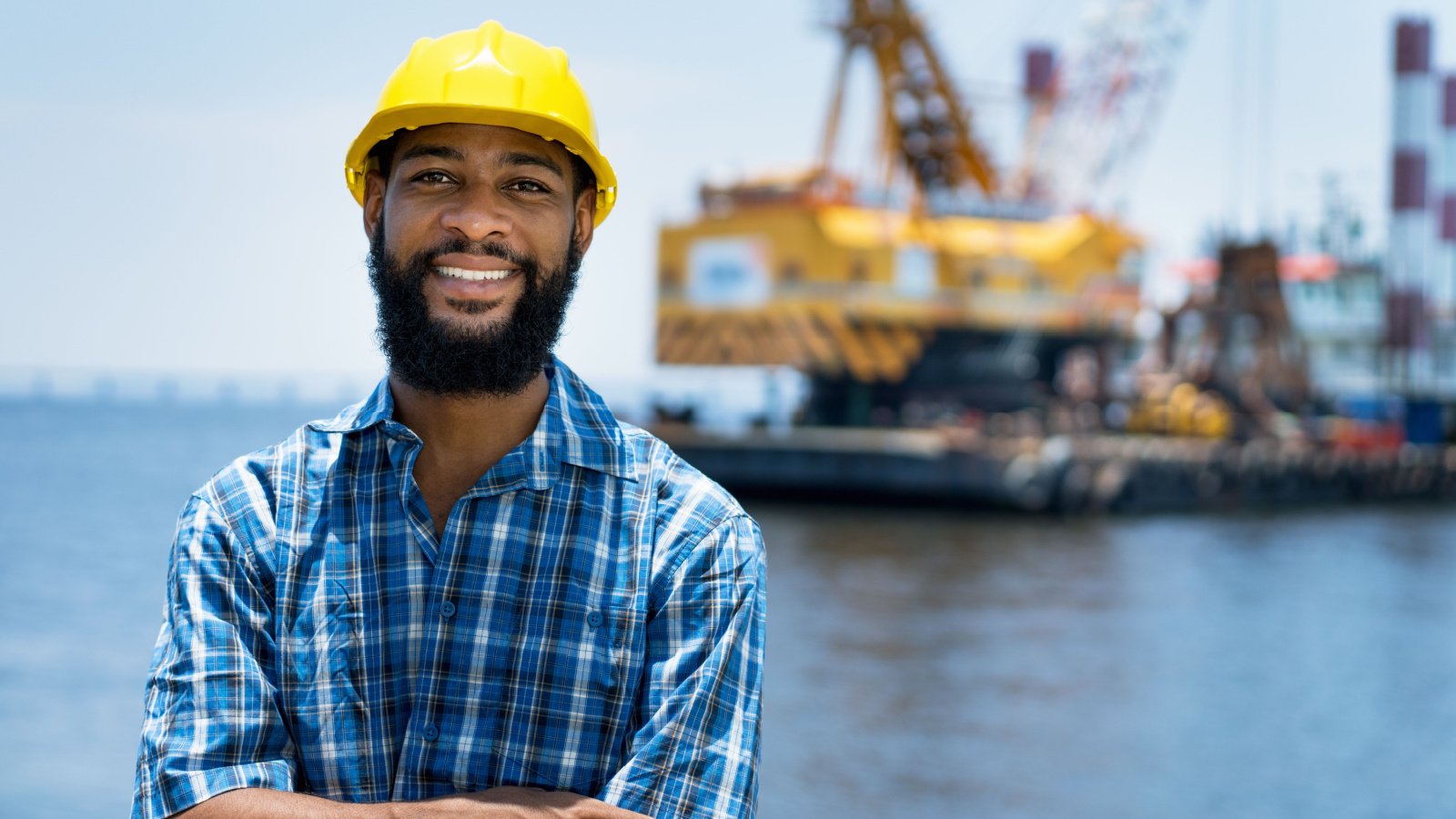 Offshore worker oil rig platform ship ocean Daniel M Ernst Shutterstock