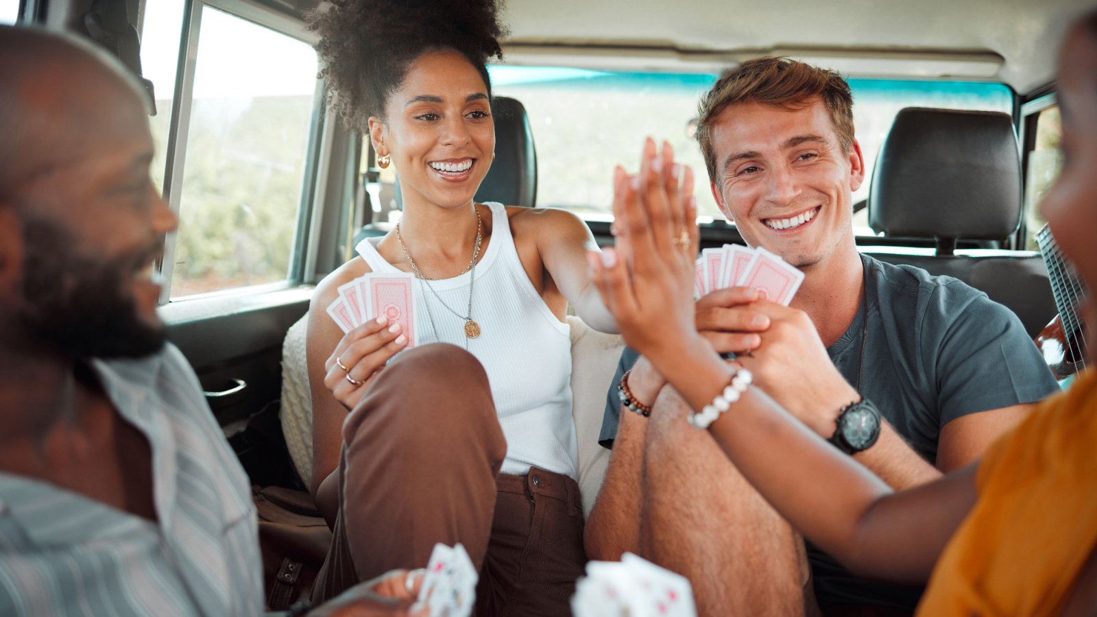 POC Friends Card Game Relax Car Happy relax PeopleImages.com Yuri A Shutterstock