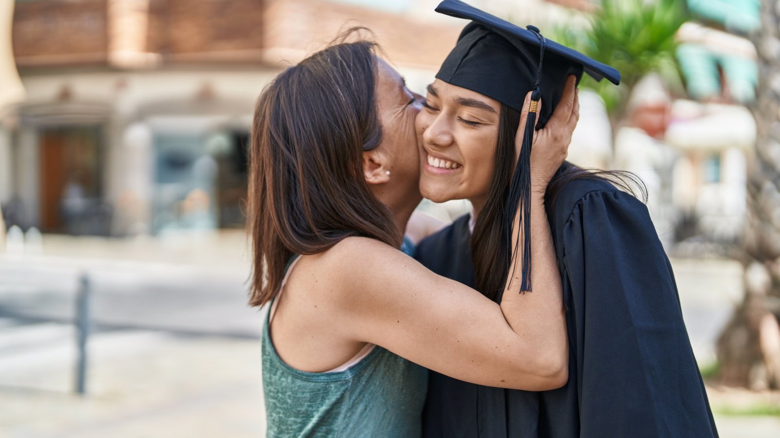 POC Graduation Graduate High School College Mother Daughter Krakenimages.com Shutterstock