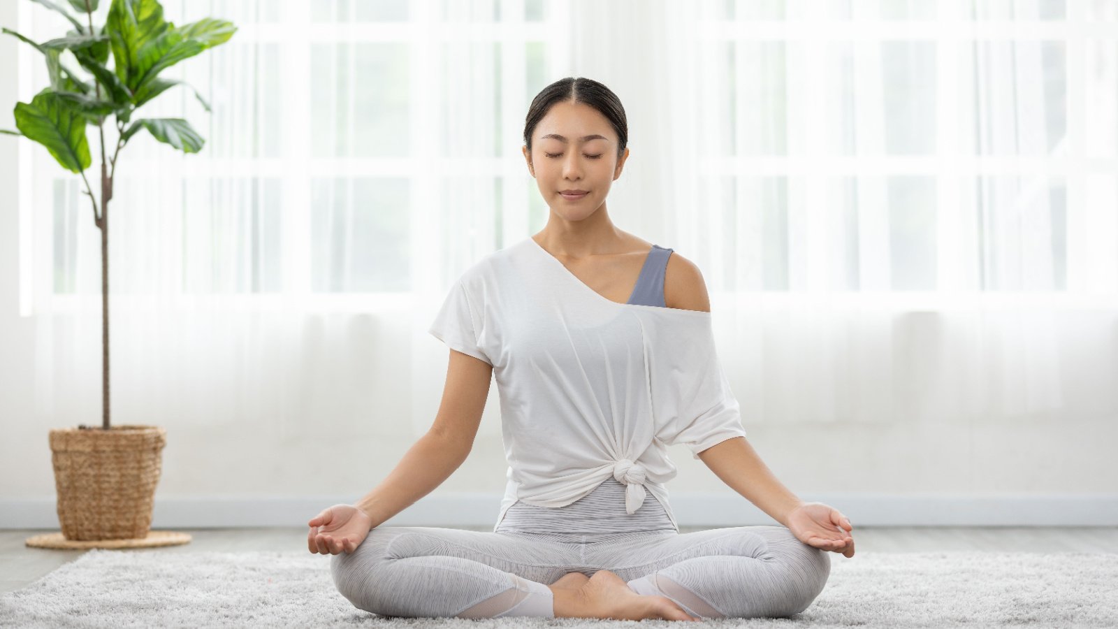 POC Woman Asian Yoga Stretch Meditation Relax Health 220 Selfmade studio Shutterstock