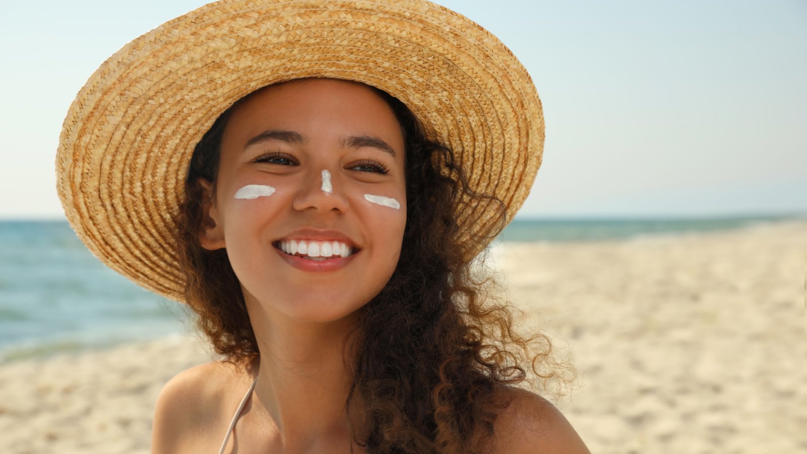 POC Woman Beach Sunscreen Hat New Africa Shutterstock