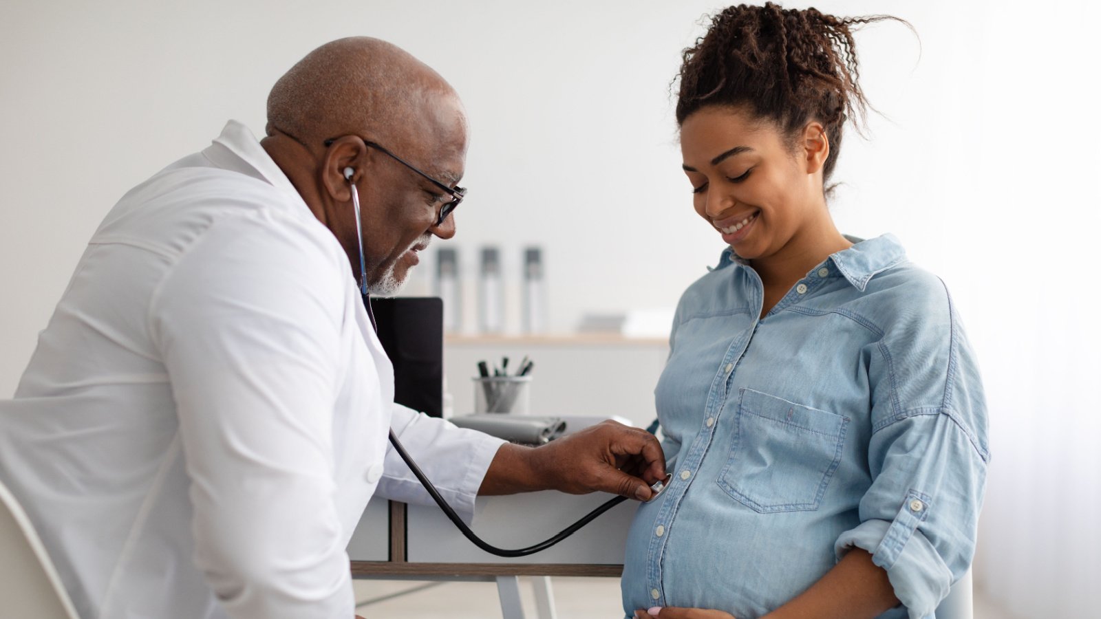 POC Woman Pregnant doctor healthy Prostock studio Shutterstock