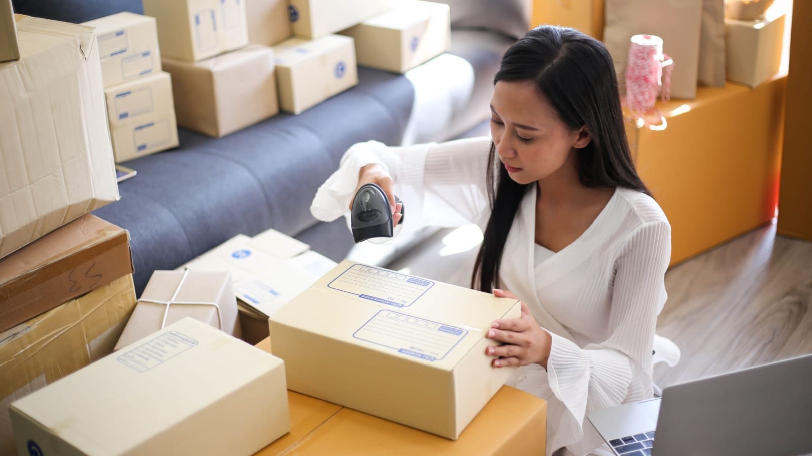 POC Woman Sustainable Packaging Seller Business Home Based ViewFinder nilsophon Shutterstock