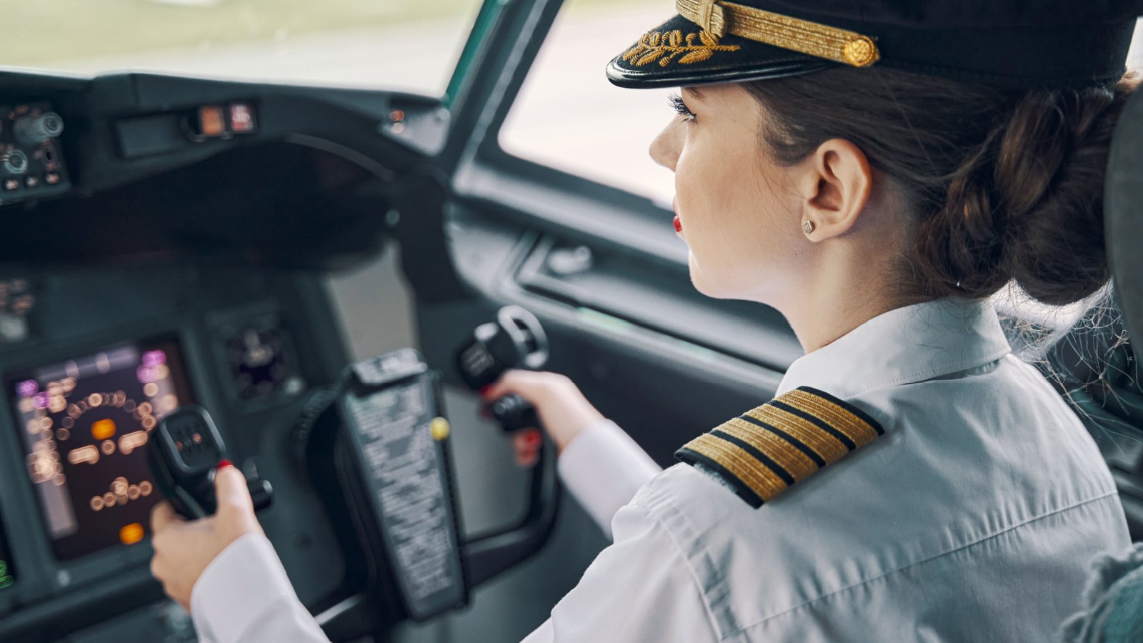 Pilot Woman Take off airplane cockpit YAKOBCHUK VIACHESLAV Shutterstock