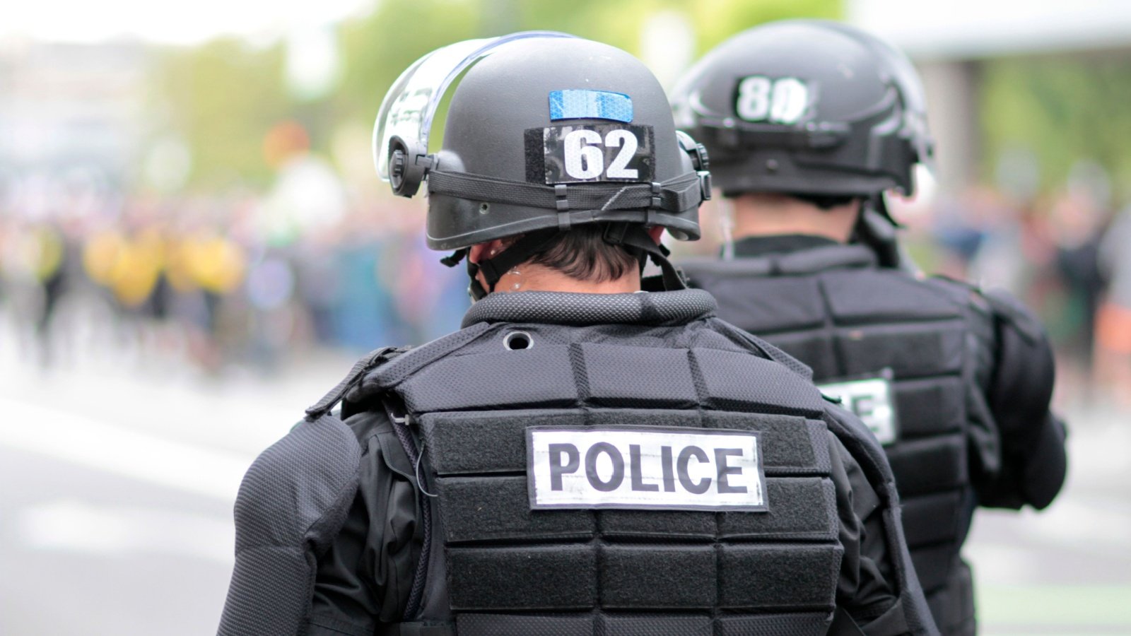 Police in Riot Gear overseeing protest Peter Kim Shutterstock