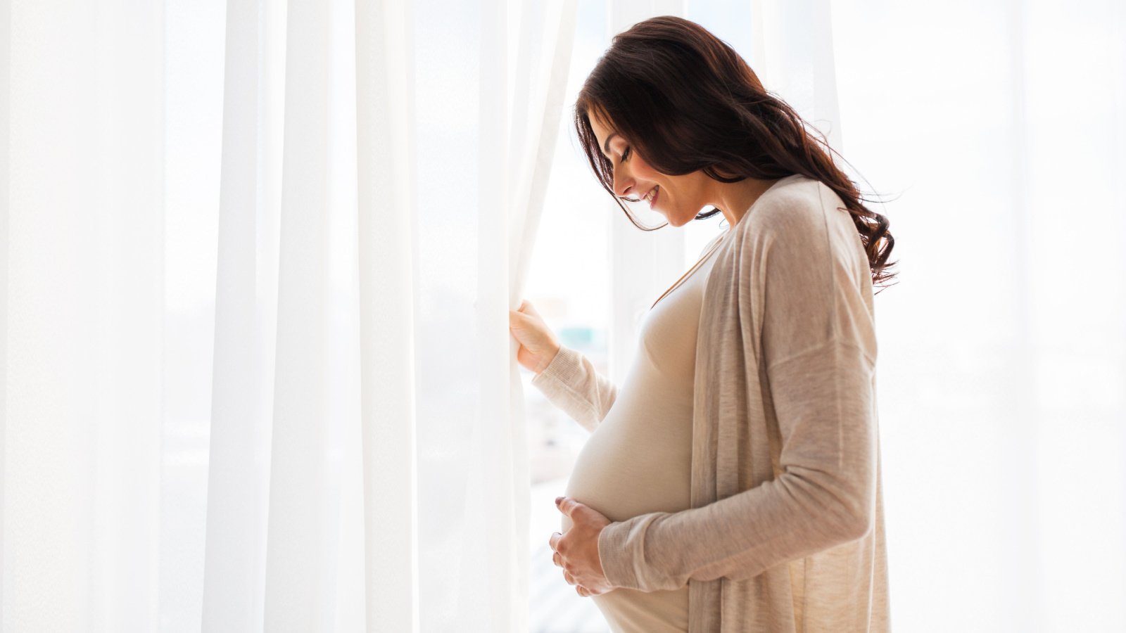 Pregnant woman pregnancy happy Ground Picture Shutterstock