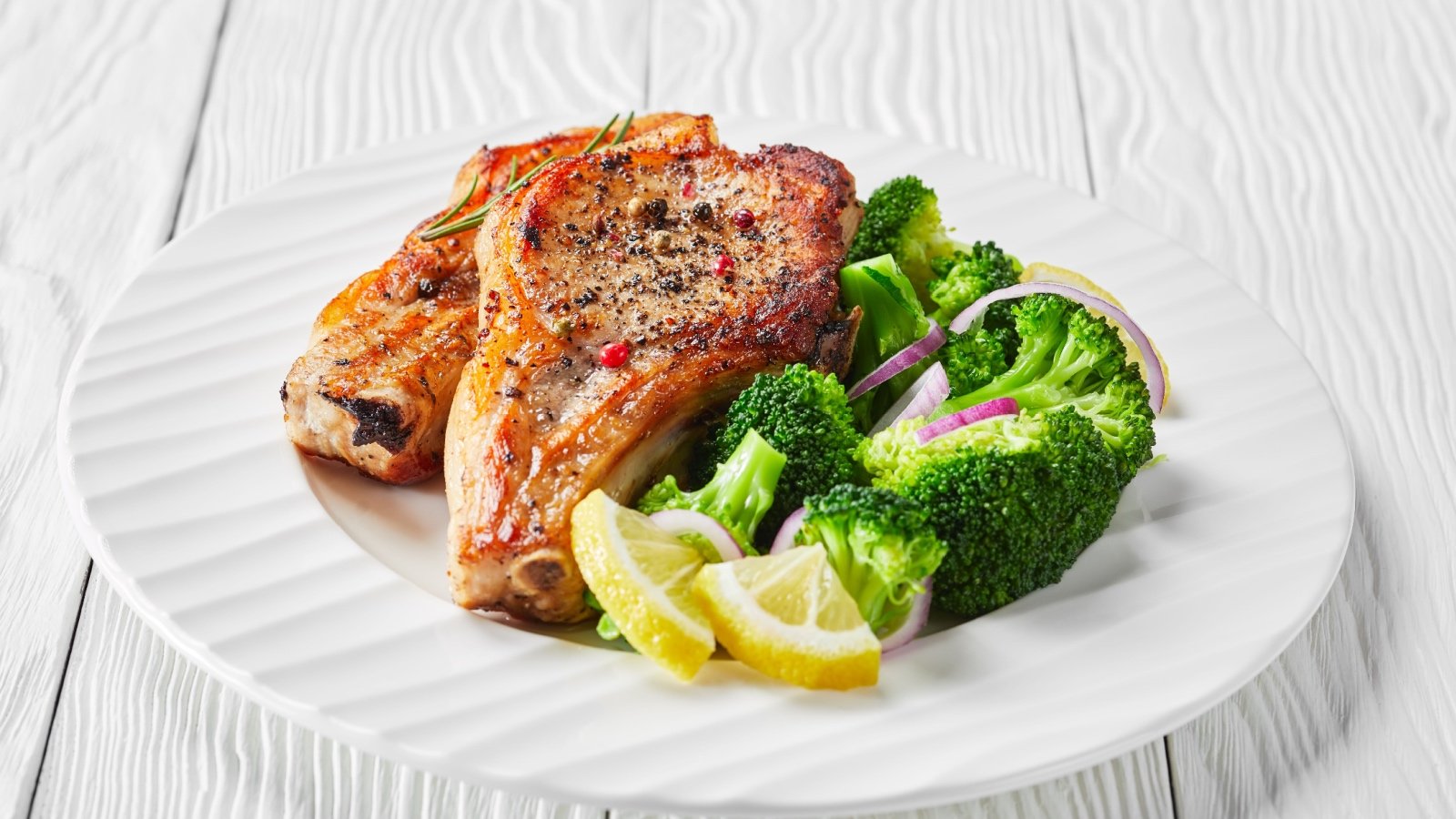 Pork chops with broccoli food from my point of view Shutterstock Pork chops with broccoli food from my point of view Shutterstock