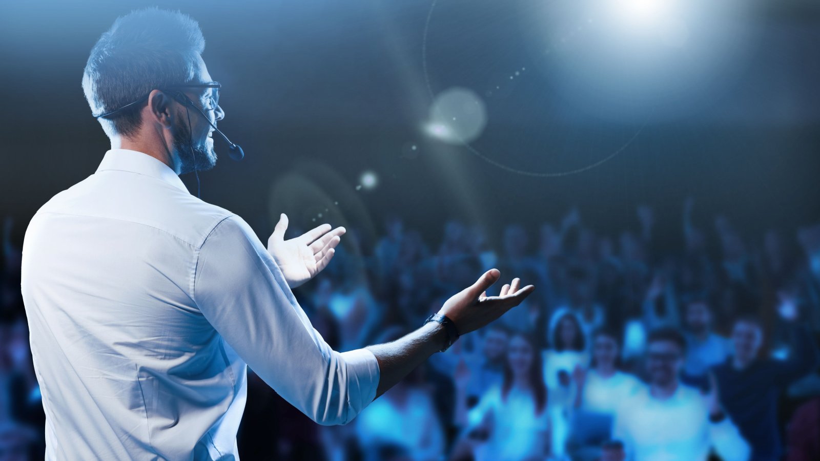 Public Speaking male crowd confident New Africa Shutterstock