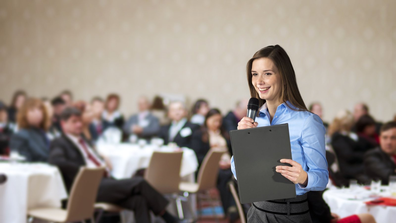 Public Speaking woman confident happy business Ground Picture Shutterstock