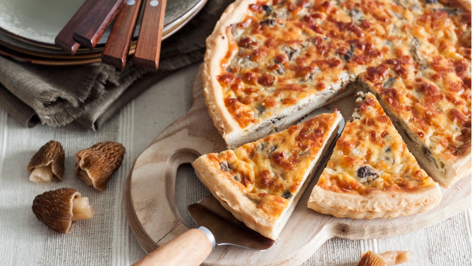 Quiche with eggs mushrooms onion and mozzarella cheese TYNZA Shutterstock