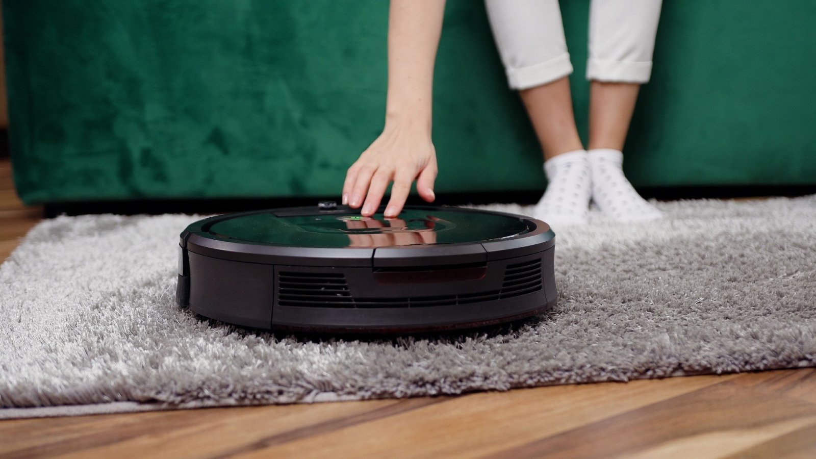 Robotic vacuum cleaner on rug Sergii Kozii Shutterstock Robotic vacuum cleaner on rug Sergii Kozii Shutterstock