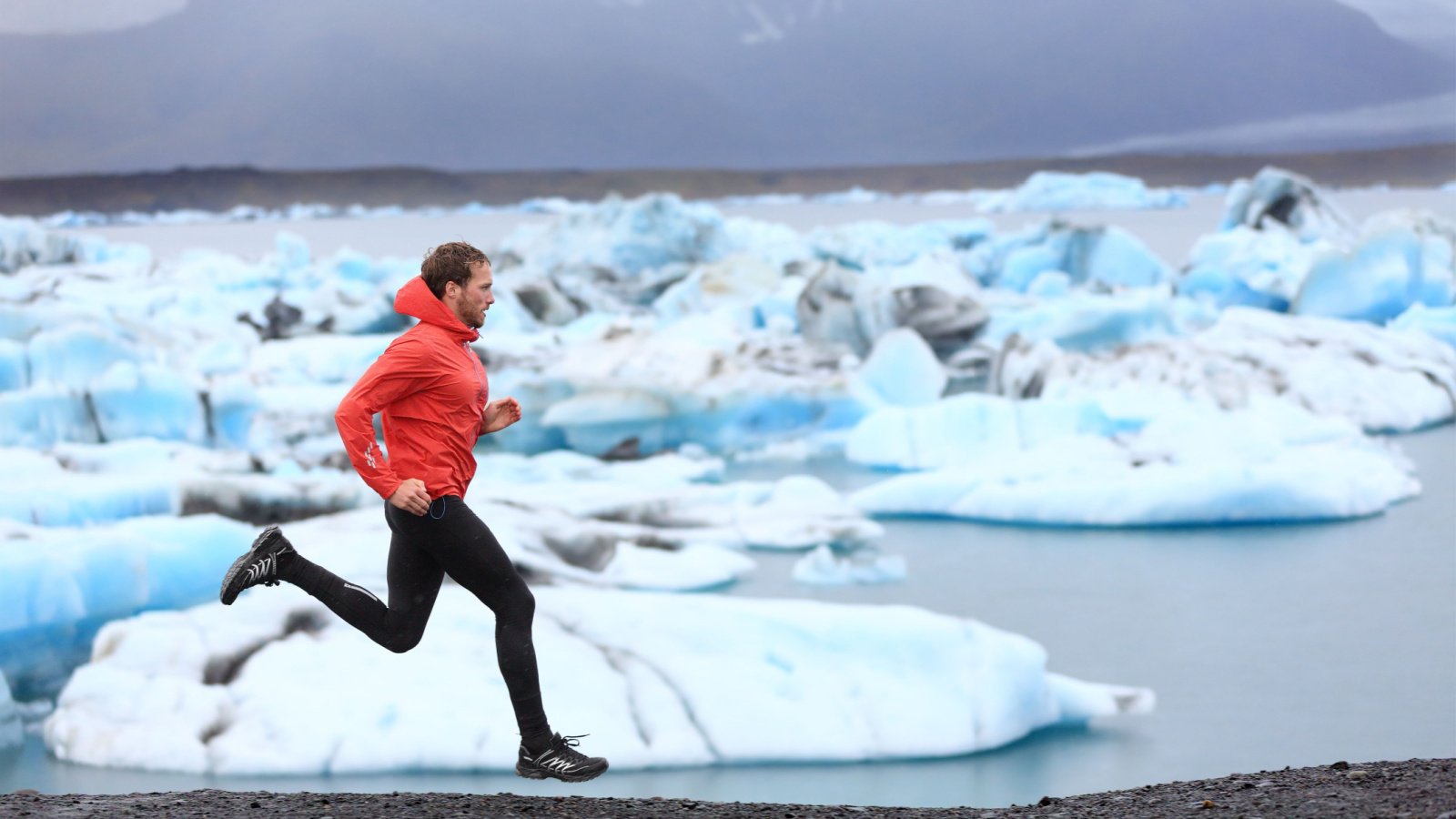 Running glacial lake Iceland extreme fitness sports Maridav Shutterstock