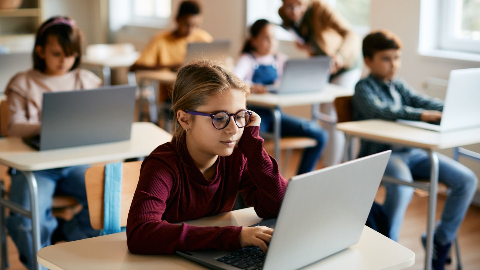 School Classroom Laptop Students Elementary Drazen Zigic Shutterstock