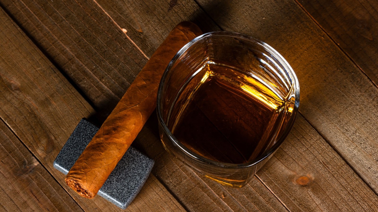 Scotch whiskey with cigar and lighter David S Swierczek Shutterstock