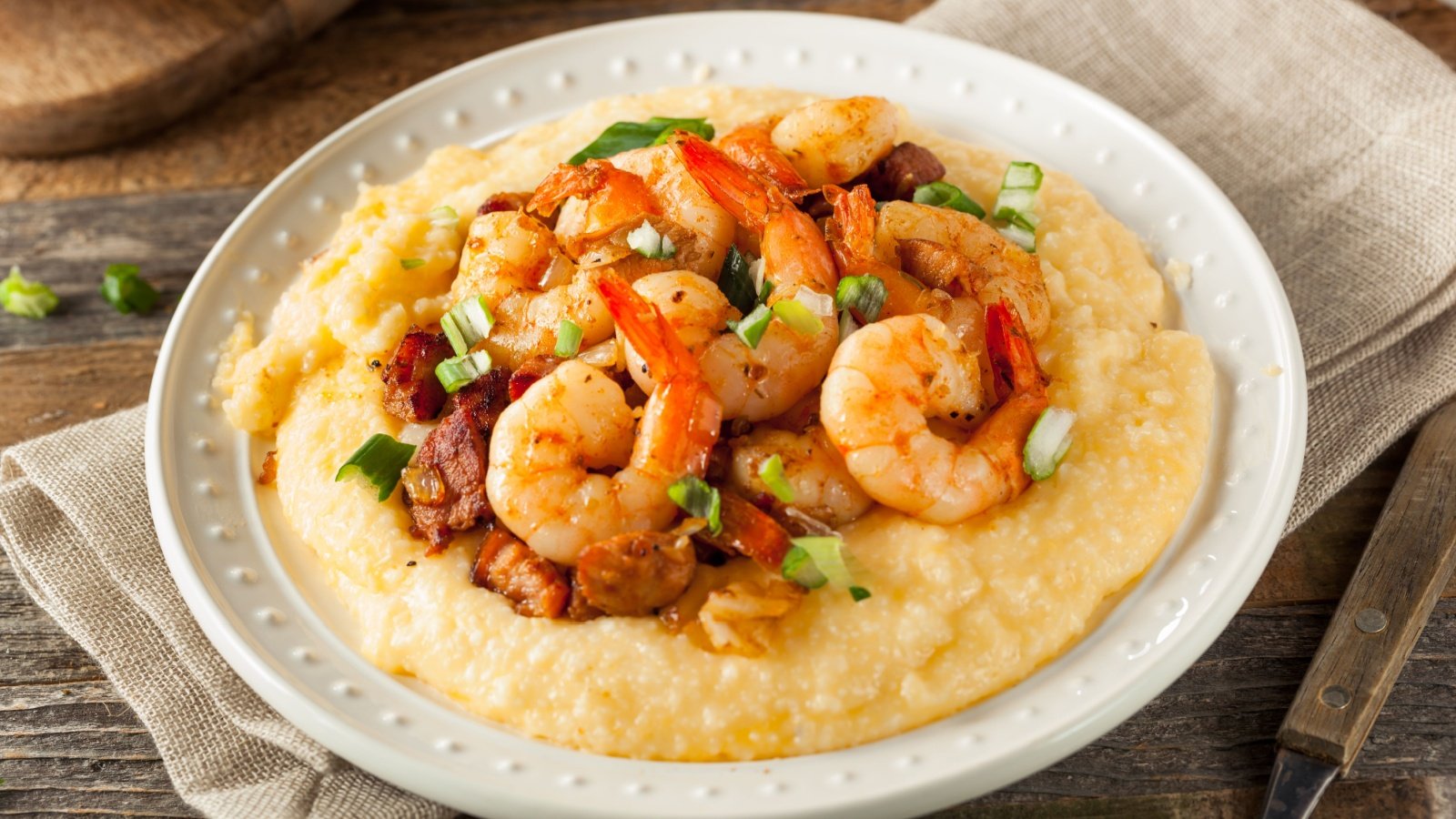 Shrimp and Grits with Pork and Cheddar food southern soul Brent Hofacker Shutterstock