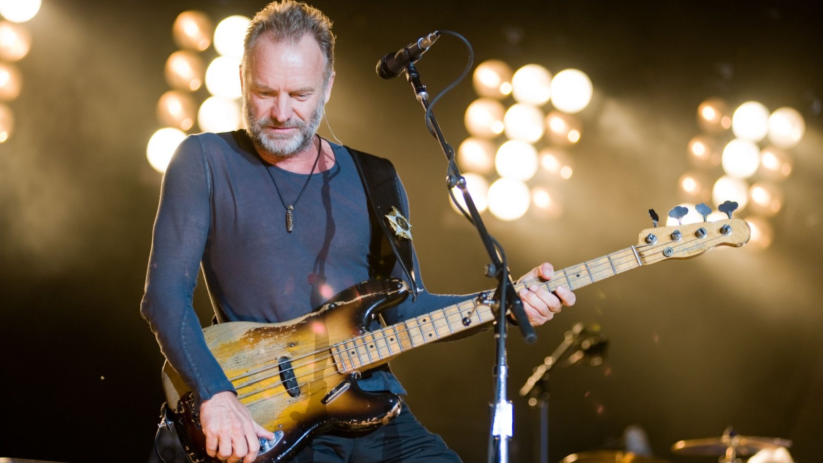 Singer Sting performs on stage police band Randy Miramontez Shutterstock