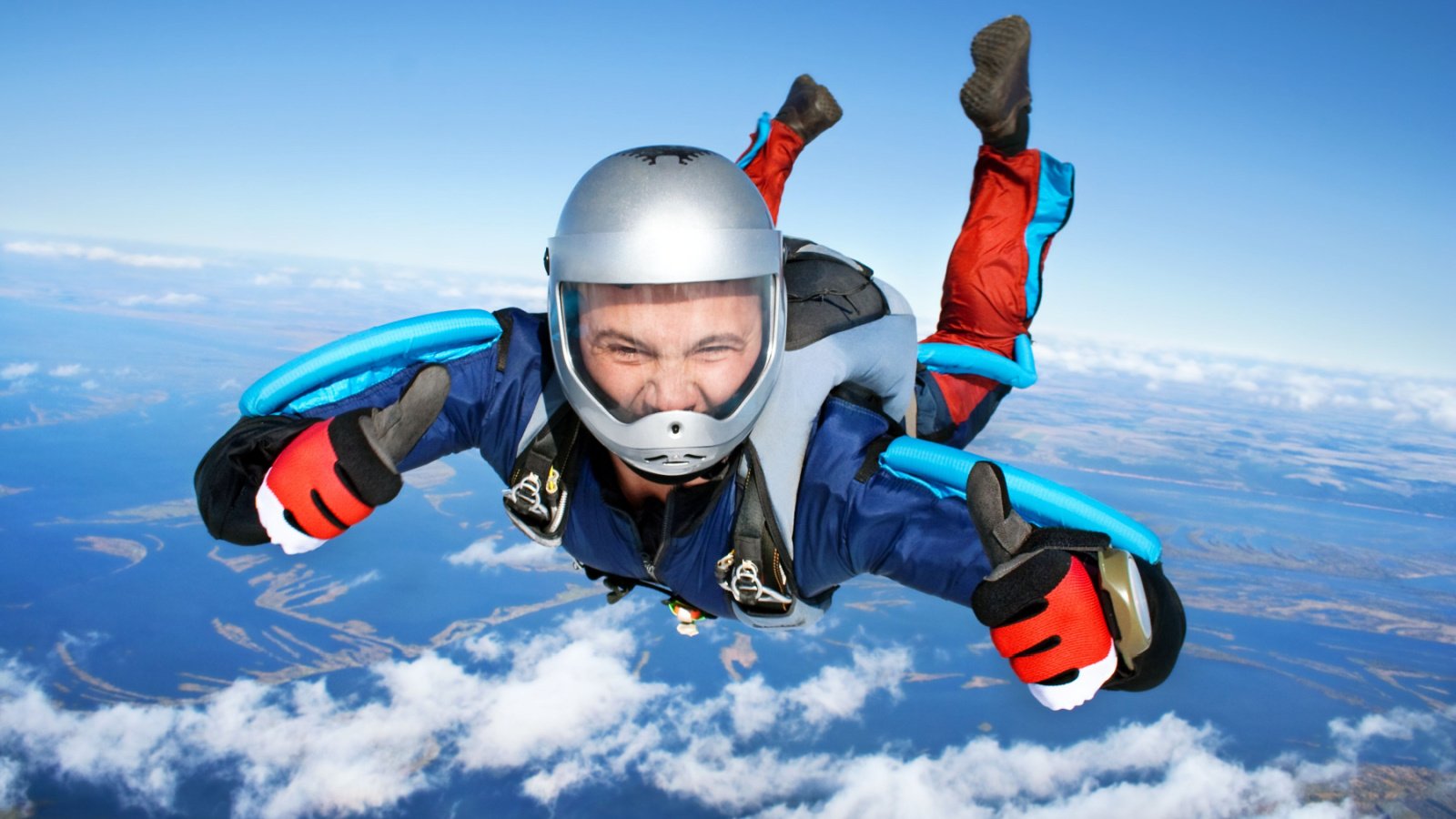 Skydiver skydiving parachuting extreme 2happy shutterstock