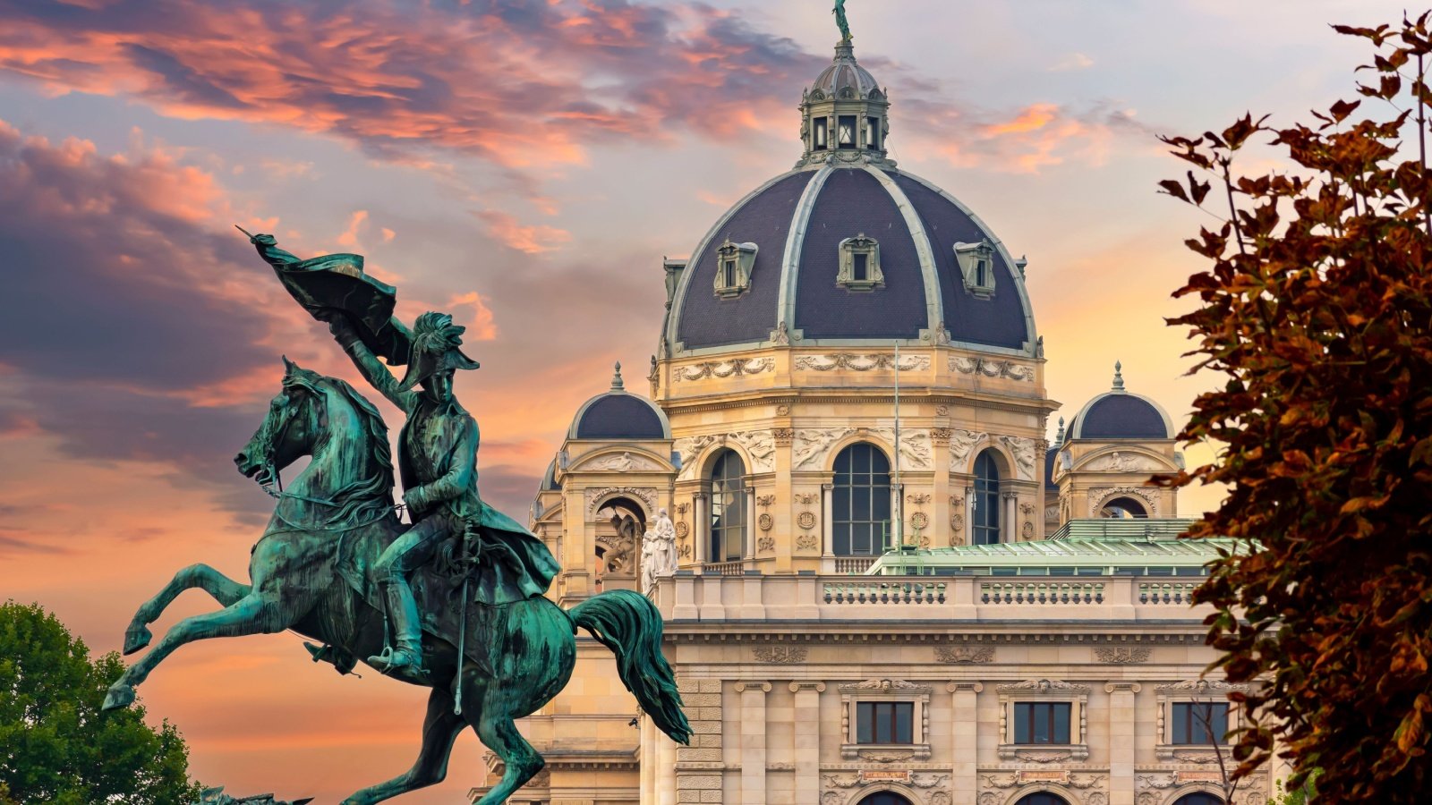 Statue of Archduke Charles and Museum of Natural History dome at sunset, Vienna, Austria Mistervlad Shutterstock