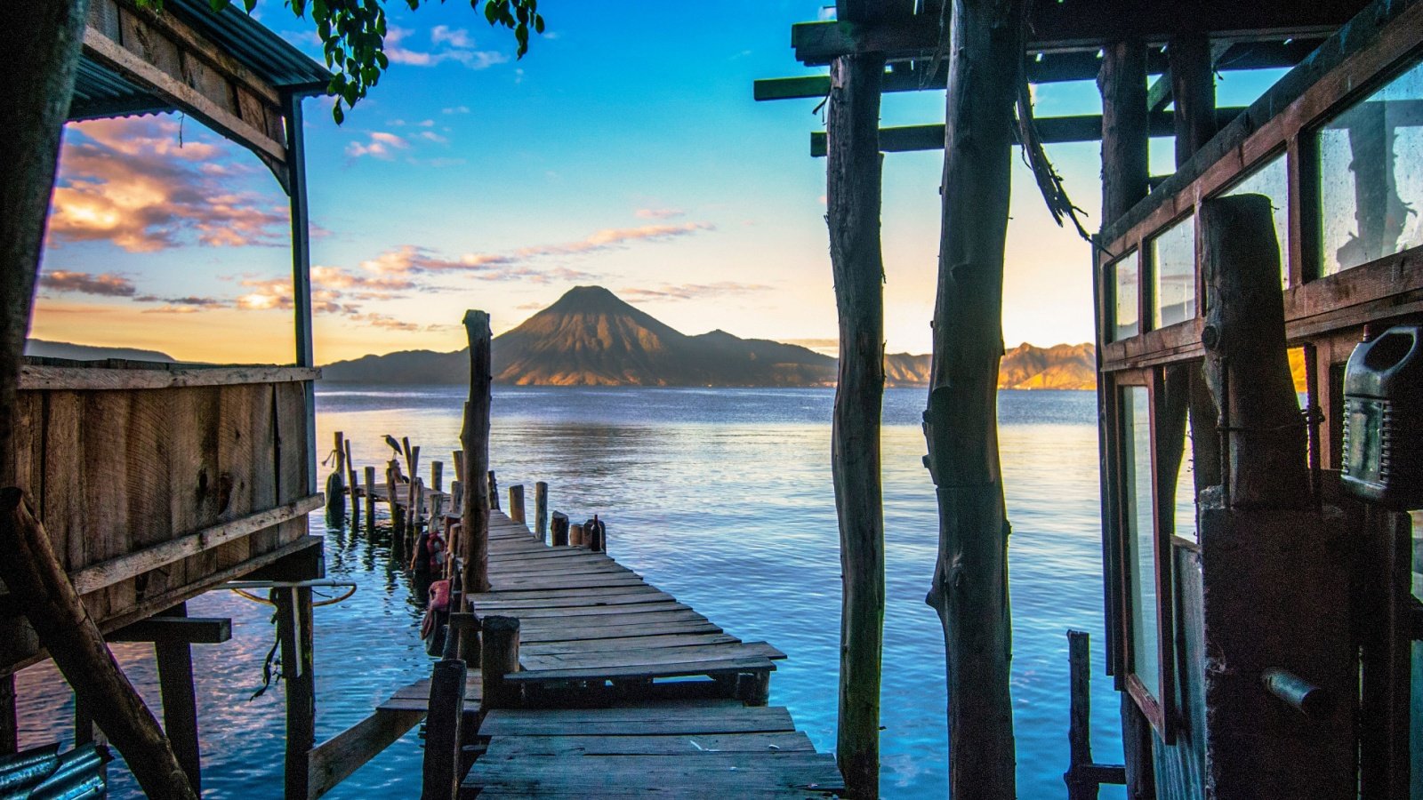 Sunrise landscape travel photo of lake Atitlán in Guatemala Mesa Studios Shutterstock