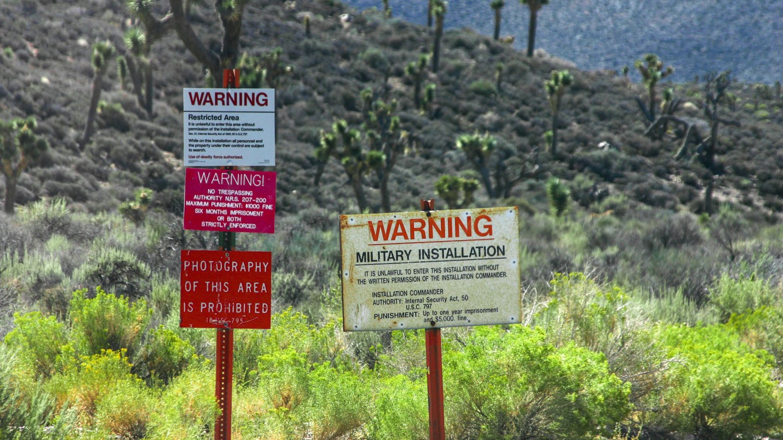 The warning signs at the entrance to Groom Lake Area 51 Marius Sipa Photography Shutterstock