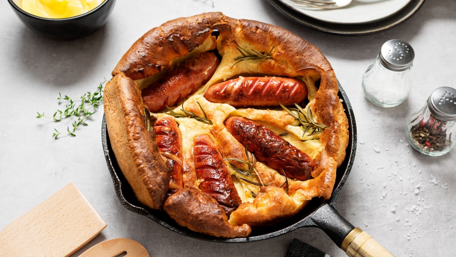 Toad in the hole sausages in Yorkshire pudding batter nelea33 Shutterstock