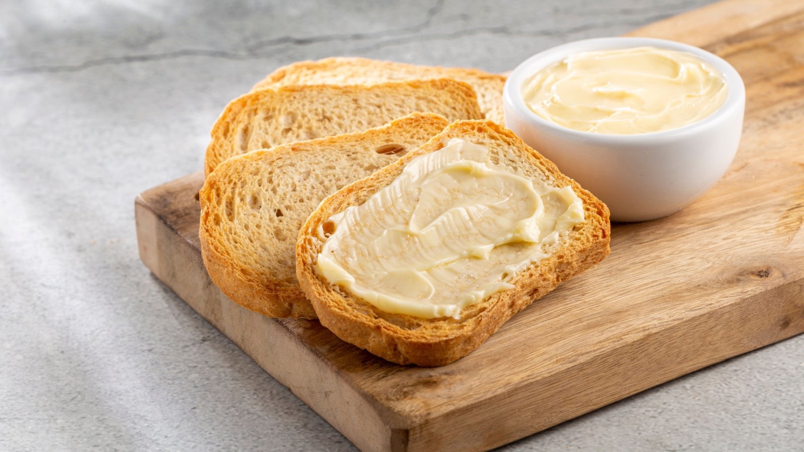 Toast with butter and margarine food WS Studio Shutterstock