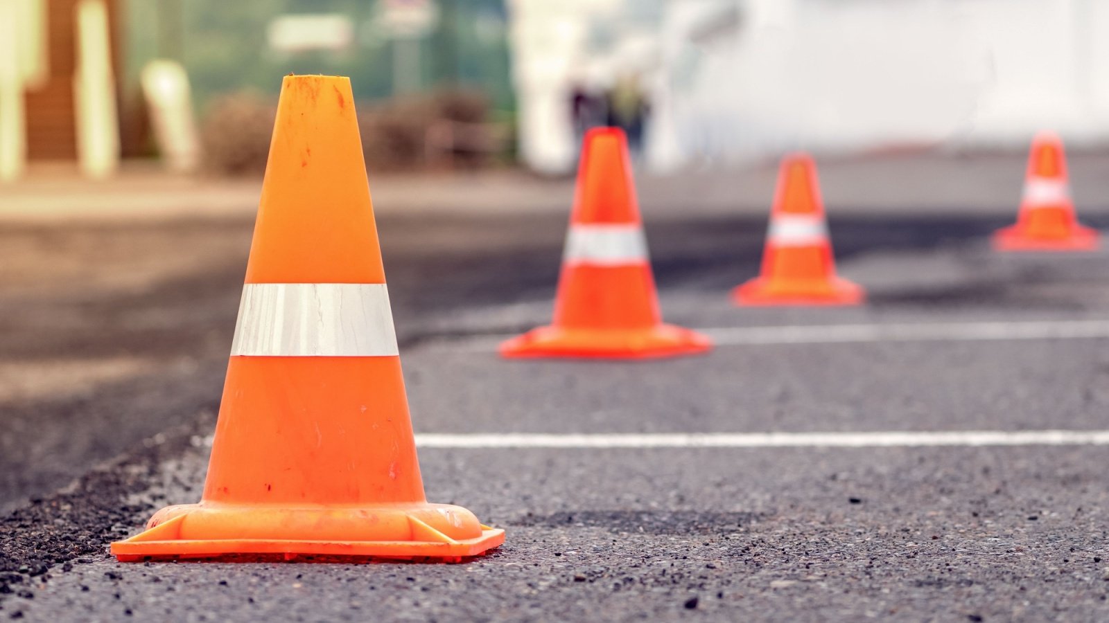 Traffic cones construction site road repairs drive drivers education safety accident parking lot pavement Vladimir Razgulyaev Shutterstock